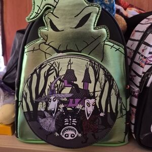 Green and Black Backpack with Spooky Design